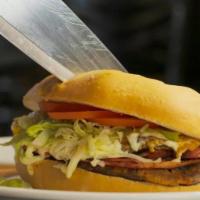 Traditional Torta Dinner · Filled with your choice of meat (steak, al pastor, chicken, ground beef or veggies) guacamol...