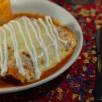 Enchiladas Dinner · 3 with your choice of sauce filled w/ your choice of meat topped with melted cheese and sour...