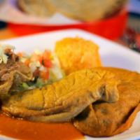 Chile Rellenos Dinner · 2 soufflé-battered cheese stuffed poblano pepper topped with our ranchero sauce.