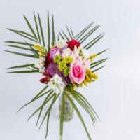 Premium Seasonal Arrangement · Assorted color flowers, roses, gerberas and other flowers with foliage designed in a glass c...