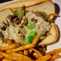 Philly · Chicken or beef, onions, peppers, served on a fresh hoagie bun smothered in swiss cheese.
