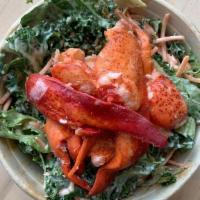 Luke'S Lobster Salad · featuring a bed of 80 Acres lettuce, Maine lobster w/ edamame, carrots, red onion, and toppe...