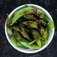 Spicy Edamame · steamed soy beans tossed with our house-made sweet + spicy sauce - vegan