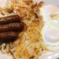 Three Eggs With Hash Browns & Meat · With ham, or bacon, or sausage, hash browns, and toast.
