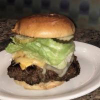Bld Intimidator · 14 Oz. homemade beef patty, grilled onions, grilled tomatoes, American cheese, lettuce, and ...