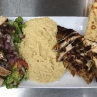 Medi · Hummus, grilled eggplant, roasted peppers, tomatoes, and red onions.
