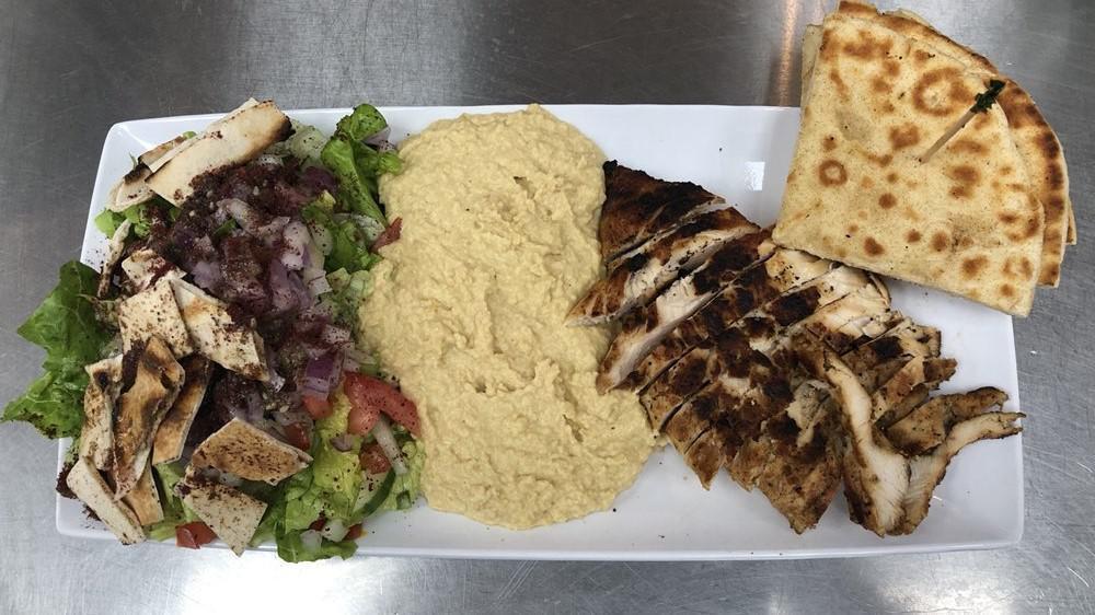 Medi · Hummus, grilled eggplant, roasted peppers, tomatoes, and red onions.