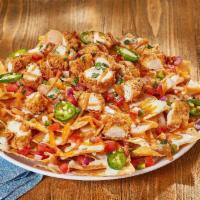 Chicken Tender Nachos · O’Charley’s famous chicken tenders, chopped. and on top of warm tortilla chips and queso,. l...