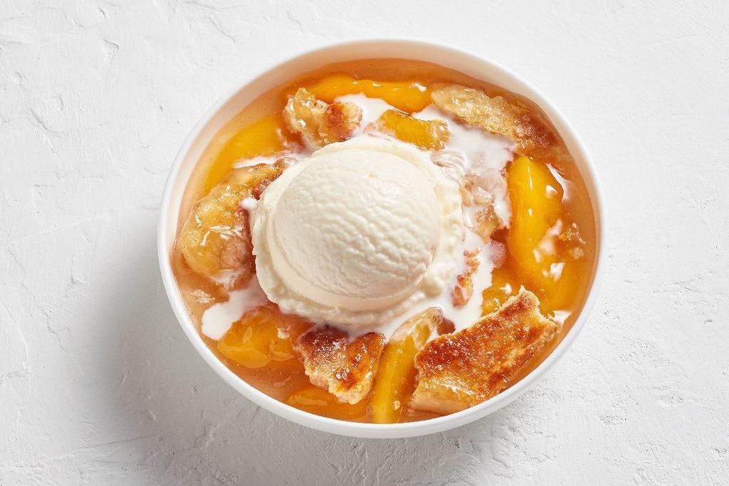Double Cobbler · Sweet, juicy peaches tucked under a layer of flaky. pie crust topped with sugar crystals.. ~ enough to share. Mix it up ~ Choose one or two flavors.. Also available in Apple or Blackberry