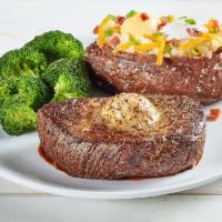 Louisiana Sirloin* · This fresh 12-oz. sirloin is grilled with Cajun seasonings and topped with Cajun butter. Ser...