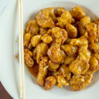 Orange Chicken · Hot and spicy. Deep fried chicken chunks seared with orange peels, bell peppers, water chest...