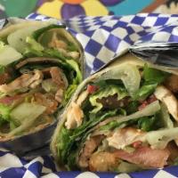 Chicken Caesar Wrap · Romaine Lettuce with Chicken, Crutons, Bacon, Tomato and Parmesan Cheese tossed in Caesar Dr...