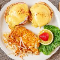 Classics Eggs Benedict · English muffin, scared Canadian bacon, poached eggs, and homemade hollandaise; accompanied w...