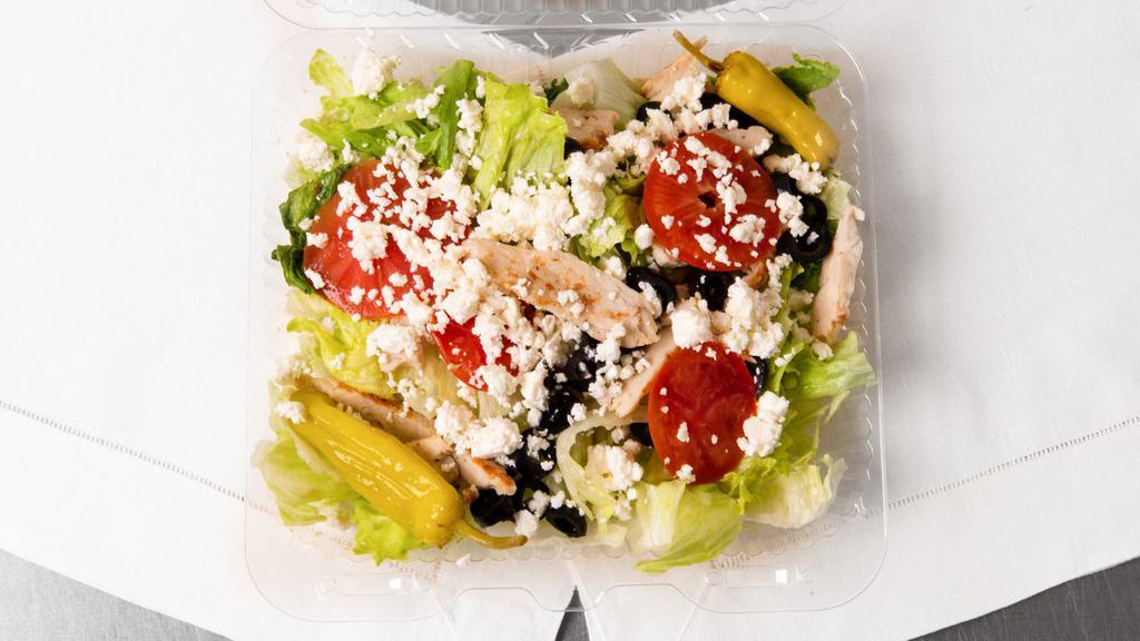 Greek Salad · Lettuce, tomatoes, onions, green peppers, black olives, feta, pepperoncini and beets