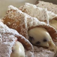 Cannoli · tube-shaped shell filled with a sweet, (creamy filling)