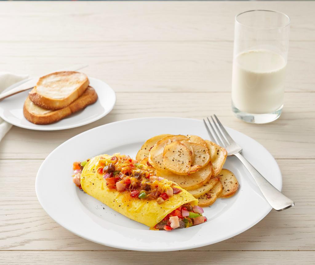 The Works Omelet* · Three eggs, sausage, ham, bacon, mushrooms, red onions, bell peppers, tomatoes, cheddar cheese. Choice of side and choice of toast or pancakes (900-1510 cal.)