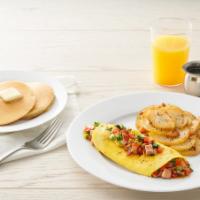 Create Your Own Omelet* · Three eggs, choice of up to 3 toppings. Choice of side and choice of toast and pancakes (630...