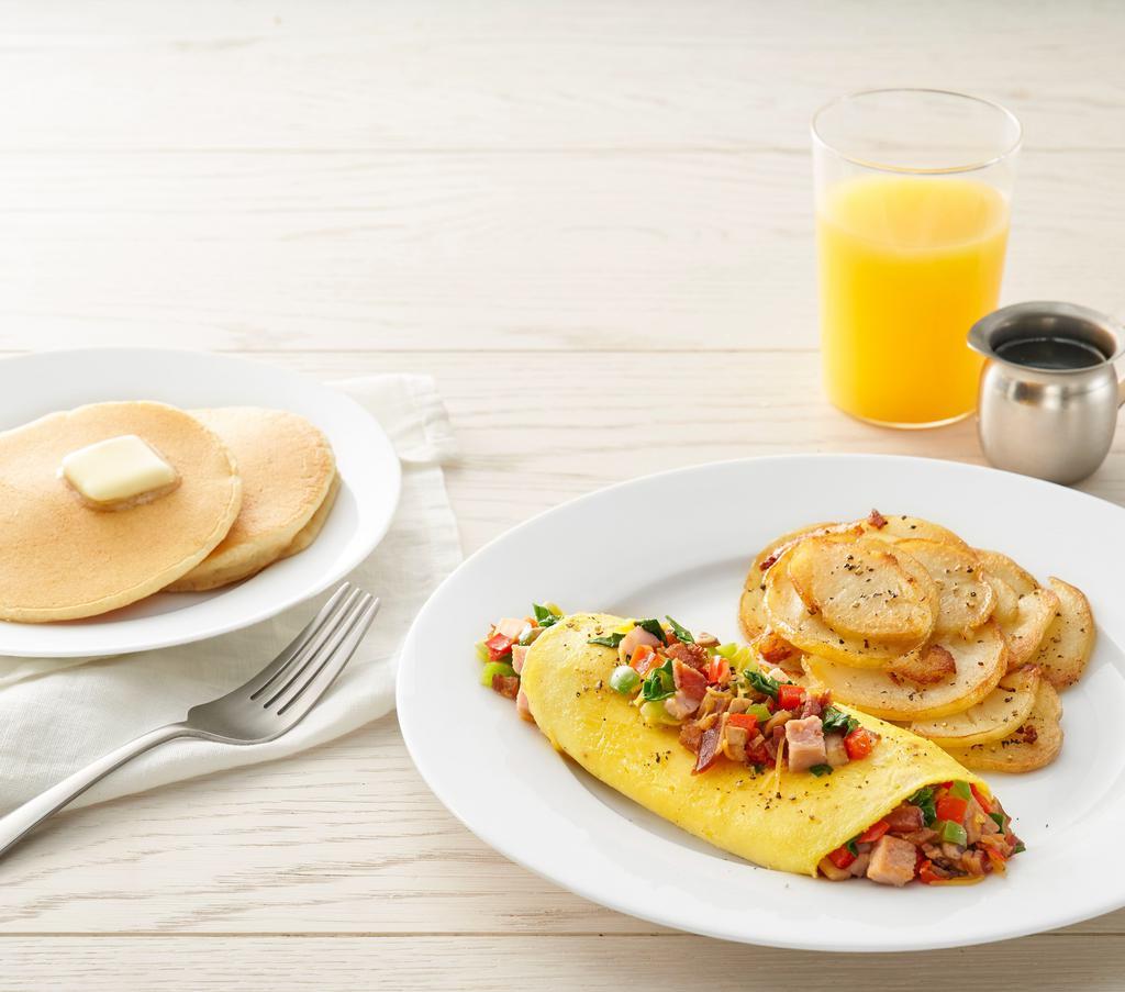 Create Your Own Omelet* · Three eggs, choice of up to 3 toppings. Choice of side and choice of toast and pancakes (630-1230 cal)