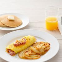 Ham & Cheese Omelet* · Three eggs, diced ham and cheddar cheese. Choice of side and choice of toast or pancakes (86...