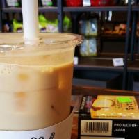Myomee Milk Tea (Cold) · Freshly brewed black tea with half & half and sweetened with our signature honey and brown s...