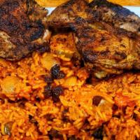 Grilled Chicken Steak With Somali Rice · Chicken steak grilled with onions, green peppers served with rice.