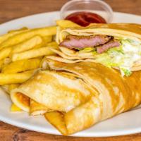Malawax Wrap With Fries · Your choice of grilled chicken or grilled beef with onions, green peppers served wraped with...
