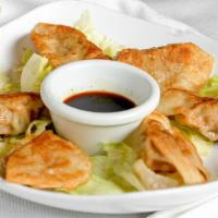 Dumplings · 6 pcs. Steamed or pan fried chicken & vegetable dumplings. Served with ginger soy sauce