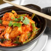 Thai Red Curry · Hot & spicy. Tofu, red onions, red peppers, mushrooms, green beans, asparagus, eggplant and ...