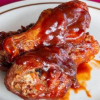 Fyre Chicken · 3 Fried  Chicken Legs  drizzled in honey butter sauce.