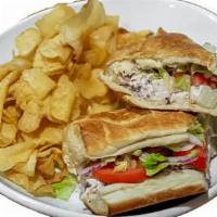 Chicken Salad · Made from scratch chicken salad, lettuce,
tomato, red onions and smoked gouda
cheese. Contai...