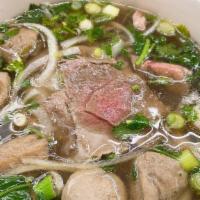 Chef Special Pho · Fresh sliced beef, meatballs, tendon, brisket and tripe.