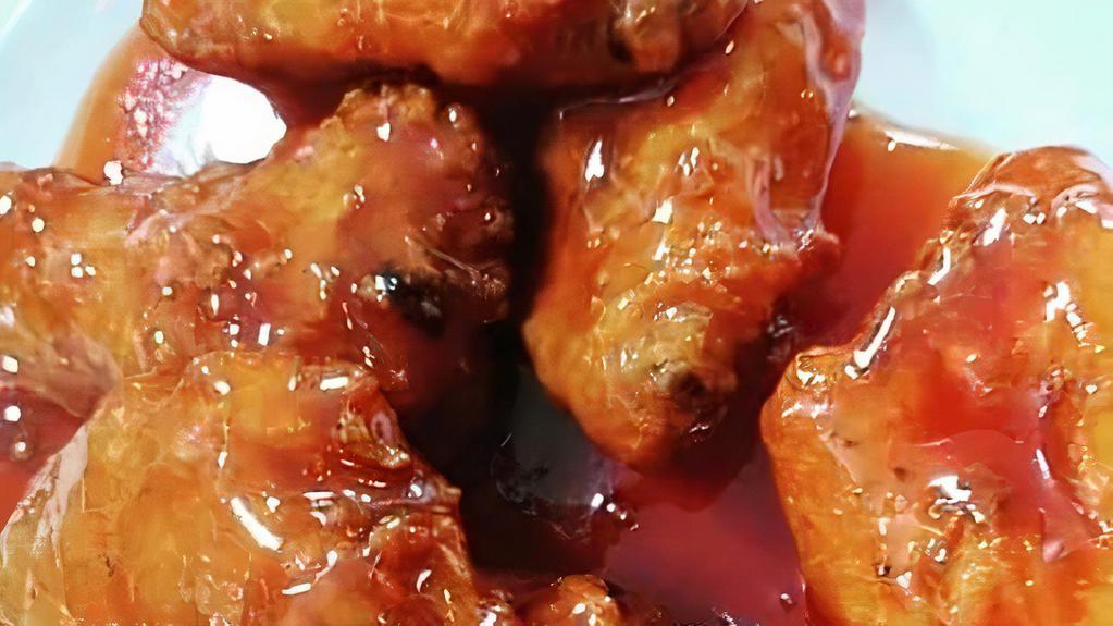 Thai Chicken Wings · 7 pieces. Golden fried chicken wings mix in thai sweet and sour sauce.
