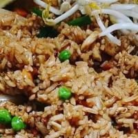 Kow Pad Fried Rice · Peas, carrots, onions, and eggs
