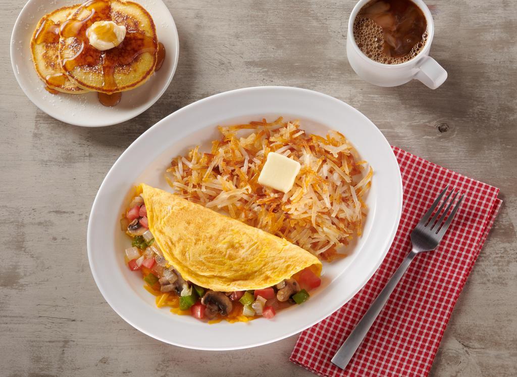 Very Veggie · three farm-fresh eggs, onion, green pepper, tomatoes, mushroom, and cheddar (served with hash browns or fresh fruit and choice of toast, hotcakes, or biscuits, substitute egg whites for an additional charge).