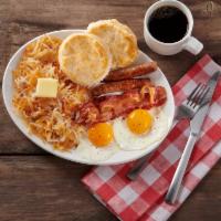 Classic · two farm-fresh eggs, two bacon strips, and two sausage links, served with hash browns or fre...