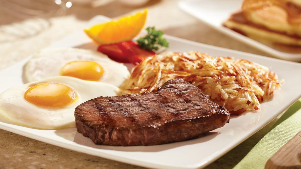Steak & Eggs · two farm-fresh eggs, 7 oz bravo steak, served with hash browns or fresh fruit, and choice of toast, hotcakes, or biscuits.
