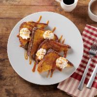 Cinnamon French Toast · hick slices of cinnamon swirl bread, whipped cream, caramel sauce and powdered sugar. Served...