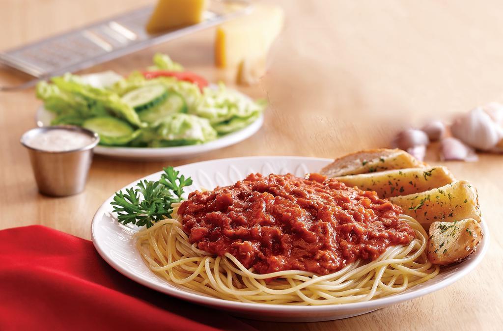 Pasta · choice of marinara or meat sauce over penne or spaghetti with a grilled garlic roll, served with a cup of soup or small house salad.
