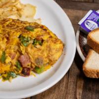 Denver Omelette · Ham, onions, green peppers and cheddar cheese.