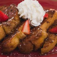 The Golden Gloves French Toast · K.o. Bread dipped in our signature batter, grilled to perfection then topped with whipped bu...