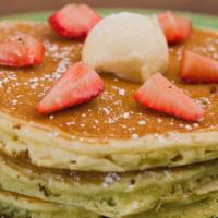 Mama Lillie'S Flapjacks · Topped with whipped butter, fresh strawberries, and powdered sugar.