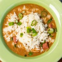 Creole Seafood Gumbo · Homemade slow-cooked roux, mixed with roasted chicken, okra, spicy beef sausage, shrimp, and...