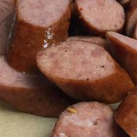 Spicy Sausage Link · Add on one link of our Spicy Sausage.