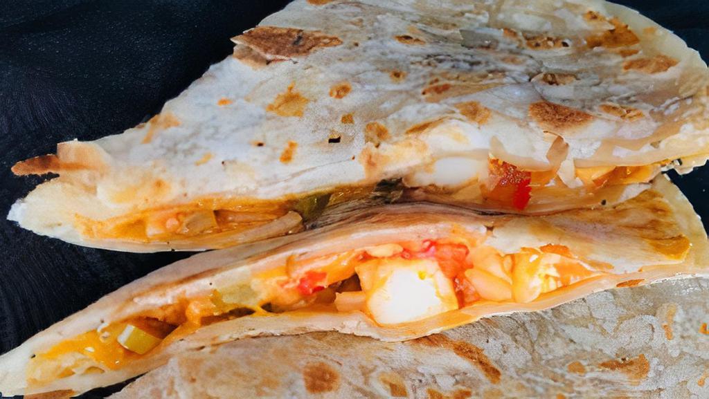 Quesadilla · Quesadilla made to order with just cheese or cheese and protein of choice
