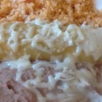 Enchilada · (beef, chicken, cheese or pork).
