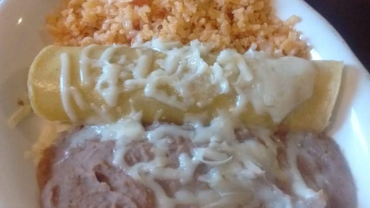 Enchilada · (beef, chicken, cheese or pork).