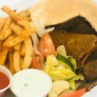 Classic Gyro Sandwich · Gyro meat inside our handmade pita bread with fresh lettuce, tomatoes, cucumbers and fries o...
