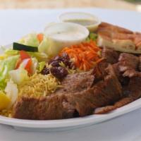 Gyro Plate · Gyro with rice, salad, raisins, carrots, and bread.