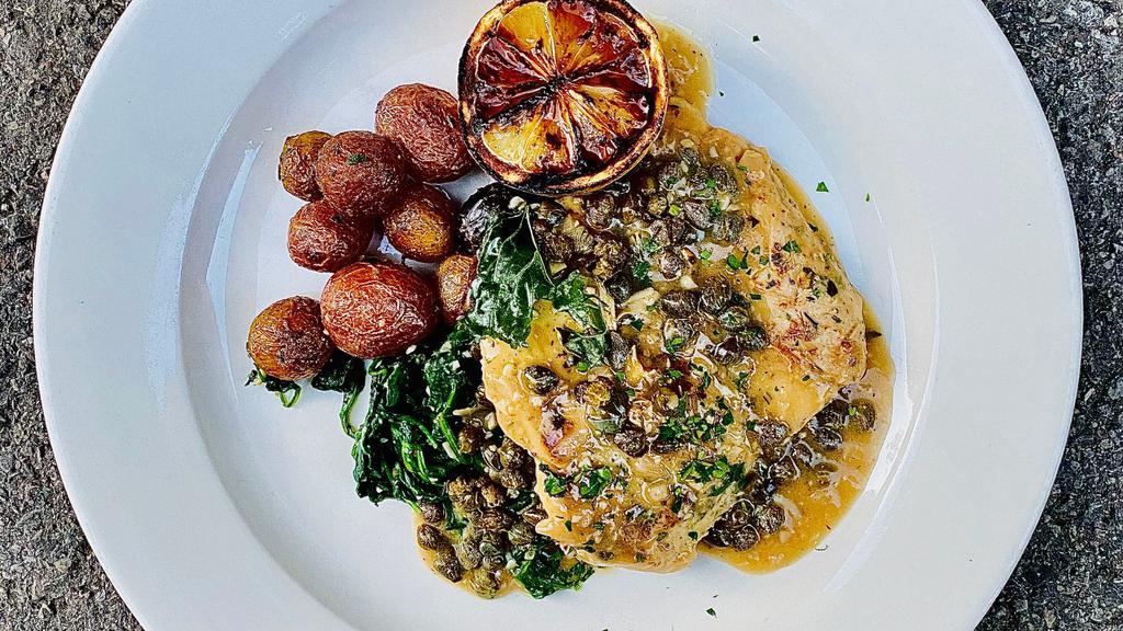 Roasted Lemon Chicken Piccata · Herb Marinated Free-Range Chicken Breast, Lemon White Wine Caper Piccata Sauce, Sauteed Garlic Spinach and Herb Roasted Fingerling Potatoes. (Gluten-free).