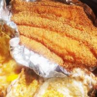 Fish & Chicks · 2 breaded catfish served with grits, eggs, and your choice of side
